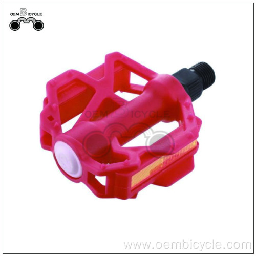 Red exercise kids bike front pedals